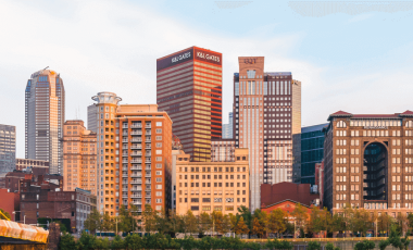 Pittsburgh skyline background for Pennsylvania car insurance laws guide